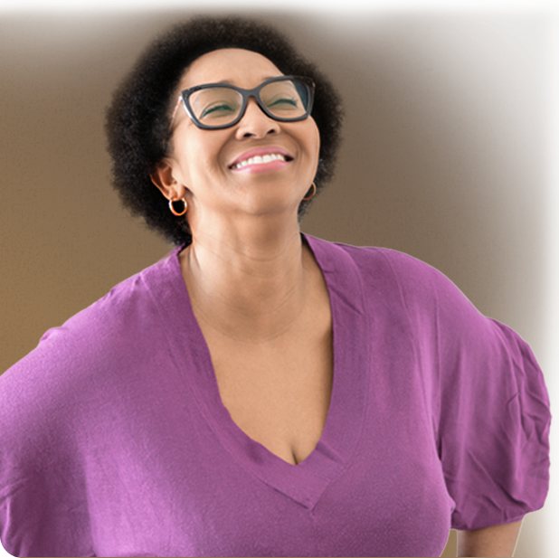 An older woman in glasses represents Black and African American people who may be affected by inflammatory bowel disease.