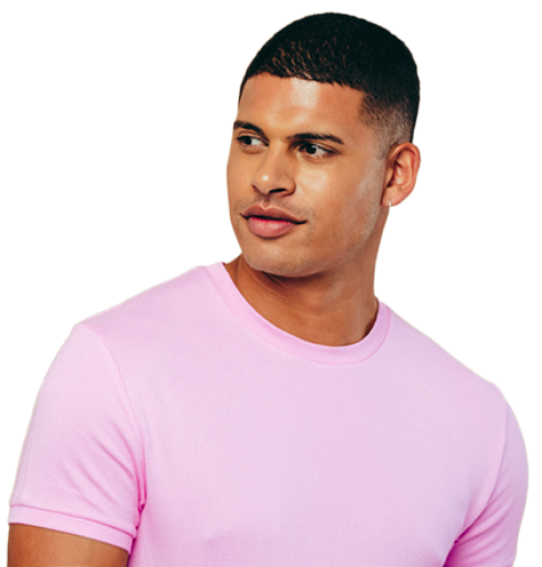 A young man in a pink shirt represents the Latine community who may be affected by inflammatory bowel disease.